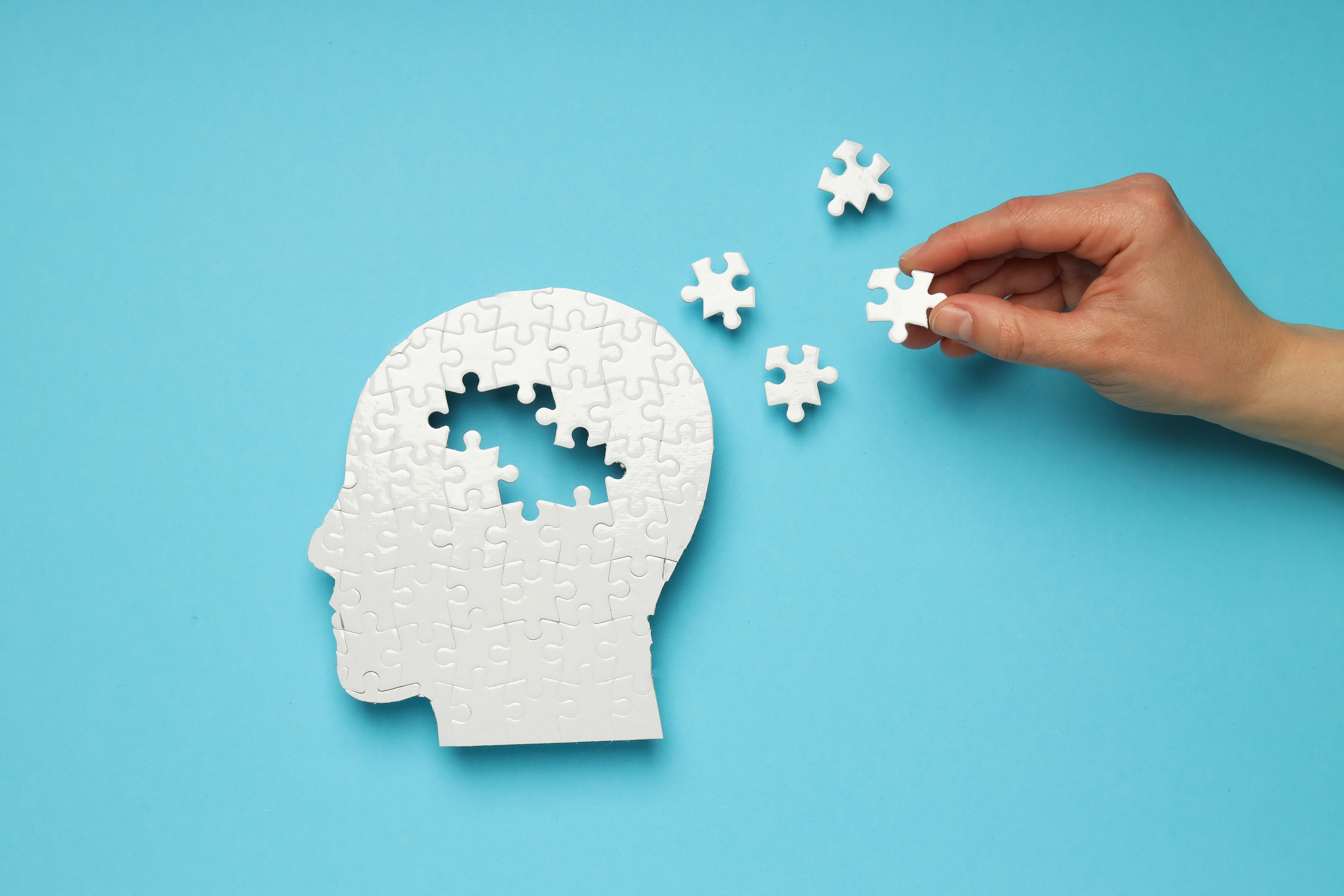 Puzzle head with missing elements on a blue background - Image credit: Atlas | stock.adobe.com 