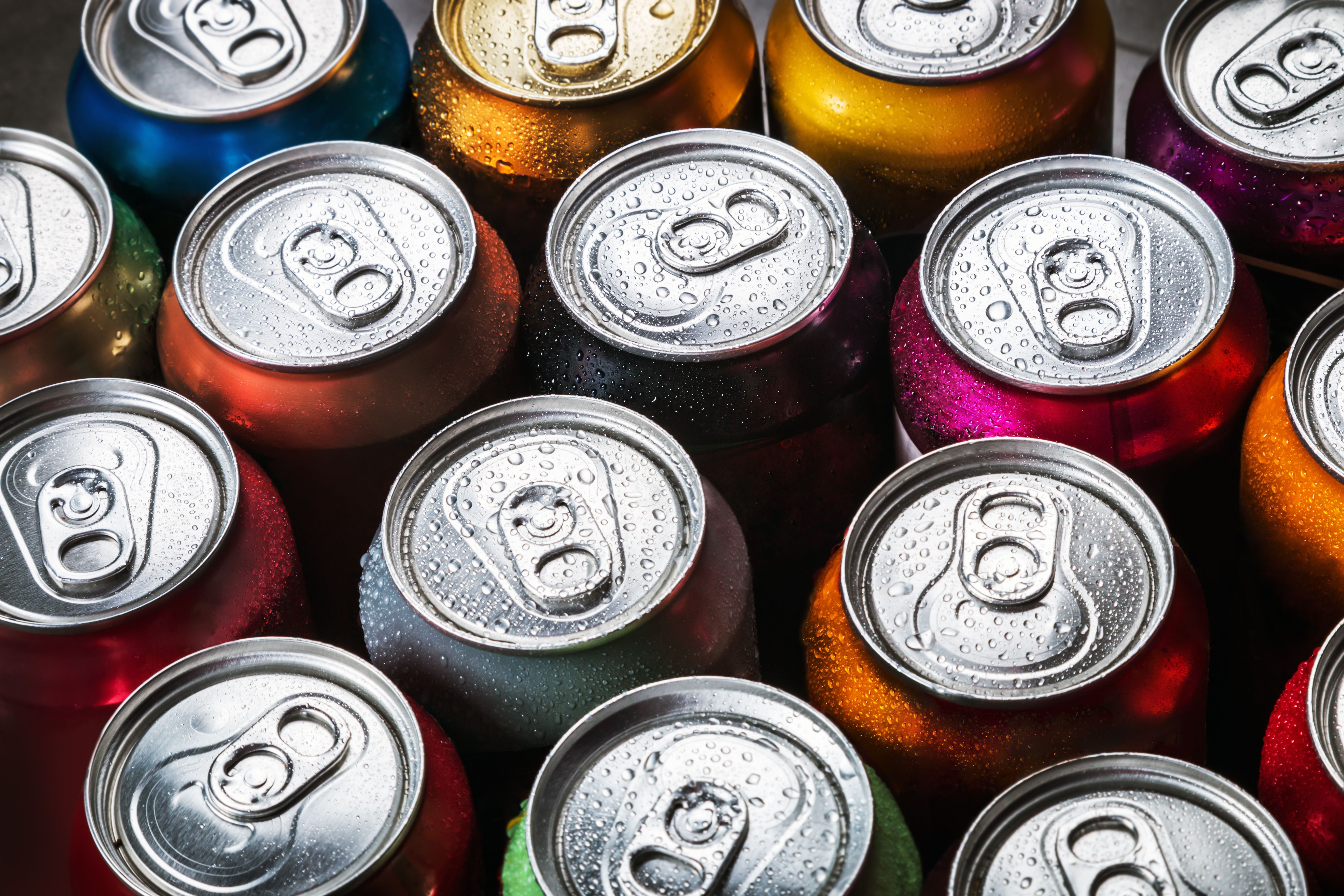 Top view of various soda cans | OlegDoroshin | stock.adobe.com