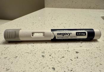 Woman Gives Wegovy Shot to Herself at Home - GLP-1 Weight Loss Prescription Medication Has Become Super Popular, Expensive, and Difficult to Obtain - Woman Giving Herself a Shot at Home - Image credit: Matt Fowler KC | stock.adobe.com