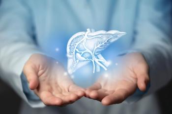 Health care professional holding a hepatitis liver. -- Image credit: mi_viri | stock.adobe.com