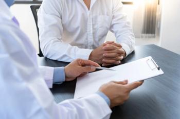 A doctor or a pharmacist is explaining the results of the treatment. With the patients who have been examined in the examination room, counseling ideas and treatment guidelines | Image Credit: crizzystudio - stock.adobe.com