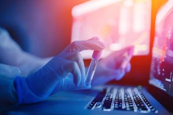 Pharmacist with a biologic drug -- Image credit: Parilov | stock.adobe.com