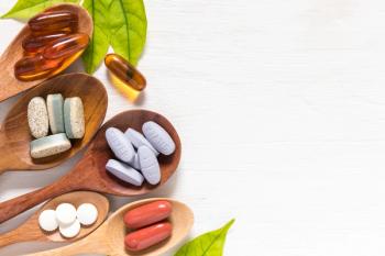 Vitamin A supplements -- Image credit: 1989STUDIO | stock.adobe.com