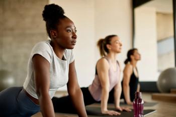 stretching during exercise class at health club: © Drazen - stock.adobe.com