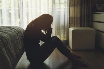 Woman suffering from anxiety -- Image credit: Kittiphan | stock.adobe.com