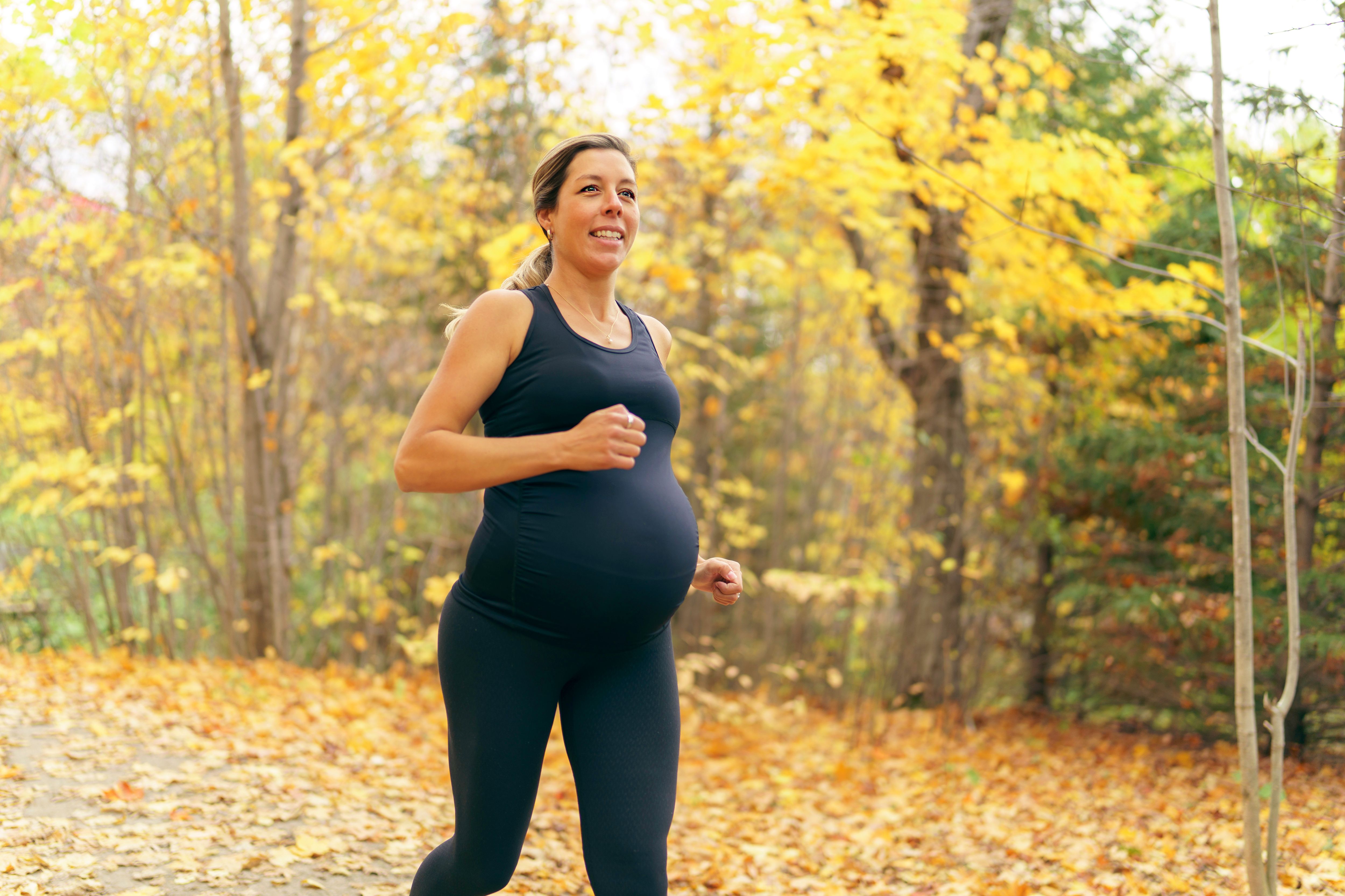 Pregnant woman going for a run -- Image credit: Louis-Photo | stock.adobe.com