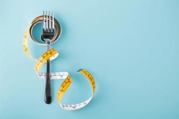 Fork with measuring tape around, diet background - Image credit: thanksforbuying | stock.adobe.com