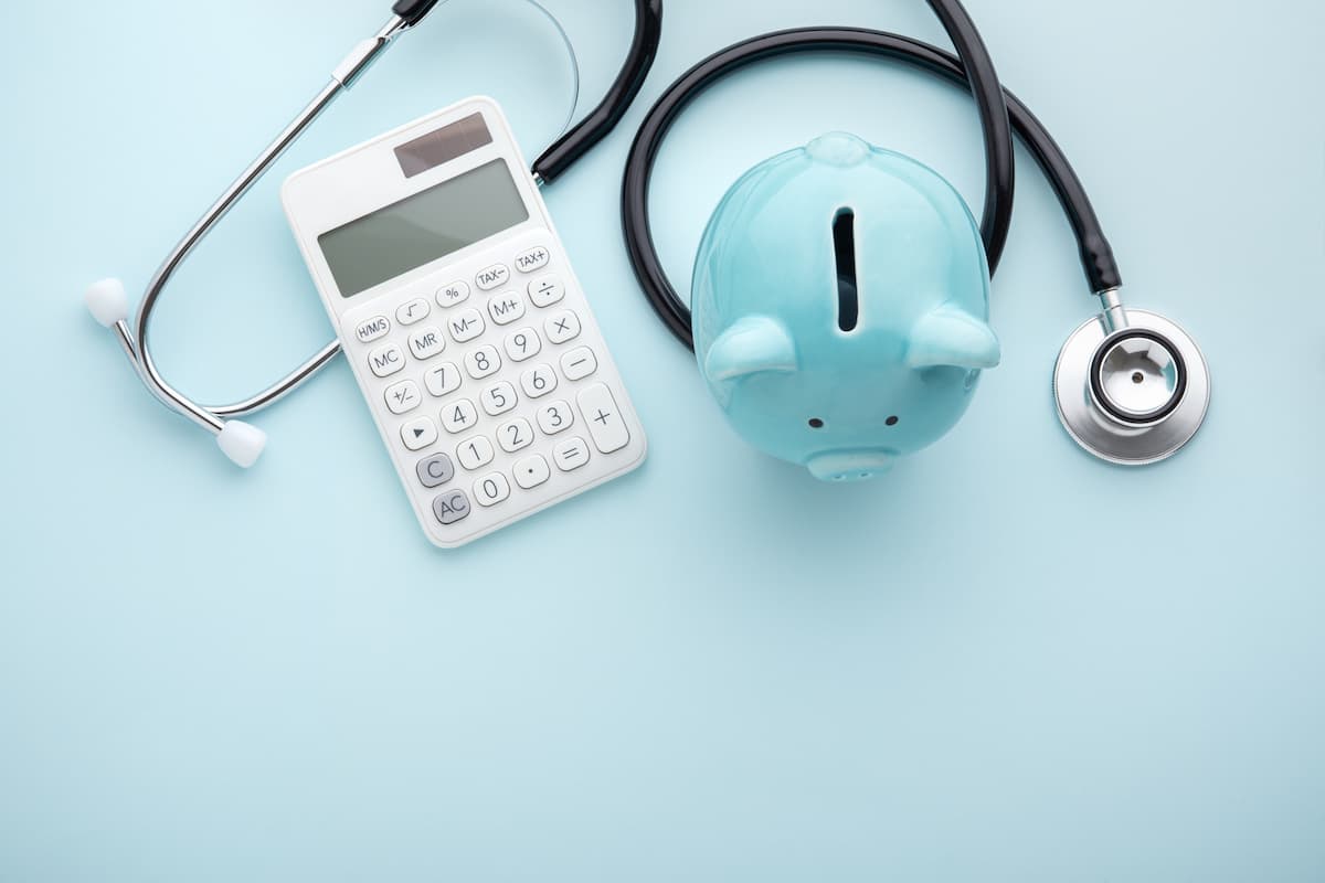 Health insurance, tax concept on blue background