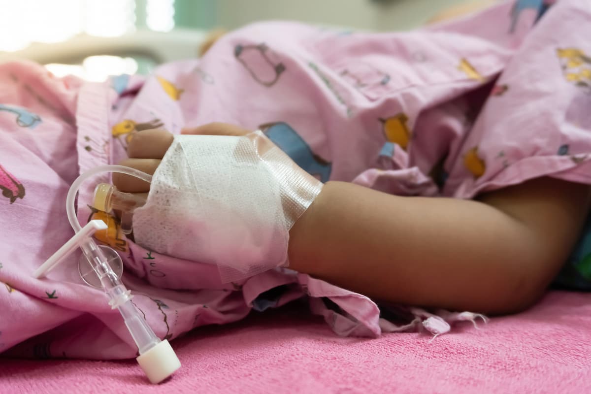 A little asian girl is sick in the hospital,Kawasaki disease