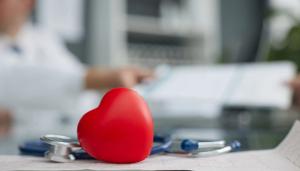 Stethoscope and heart-shaped stress toy on counter -- Image credit: Katsiaryna | stock.adobe.com