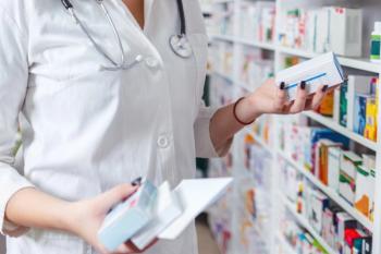 Woman pharmacist holding prescription checking medicine in pharmacy - drugstore. | Image Credit: Karanov Images | stock.adobe.com