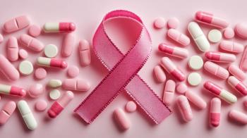 Pink ribbon and pills on color background. Breast cancer awareness concept. pink ribbon symbol of breast cancer with medicines. 3d illustration. | Image Credit: Tichila | stock.adobe.com
