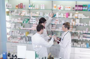 Pharmacist and pharmacy students -- Image credit: .shock | stock.adobe.com