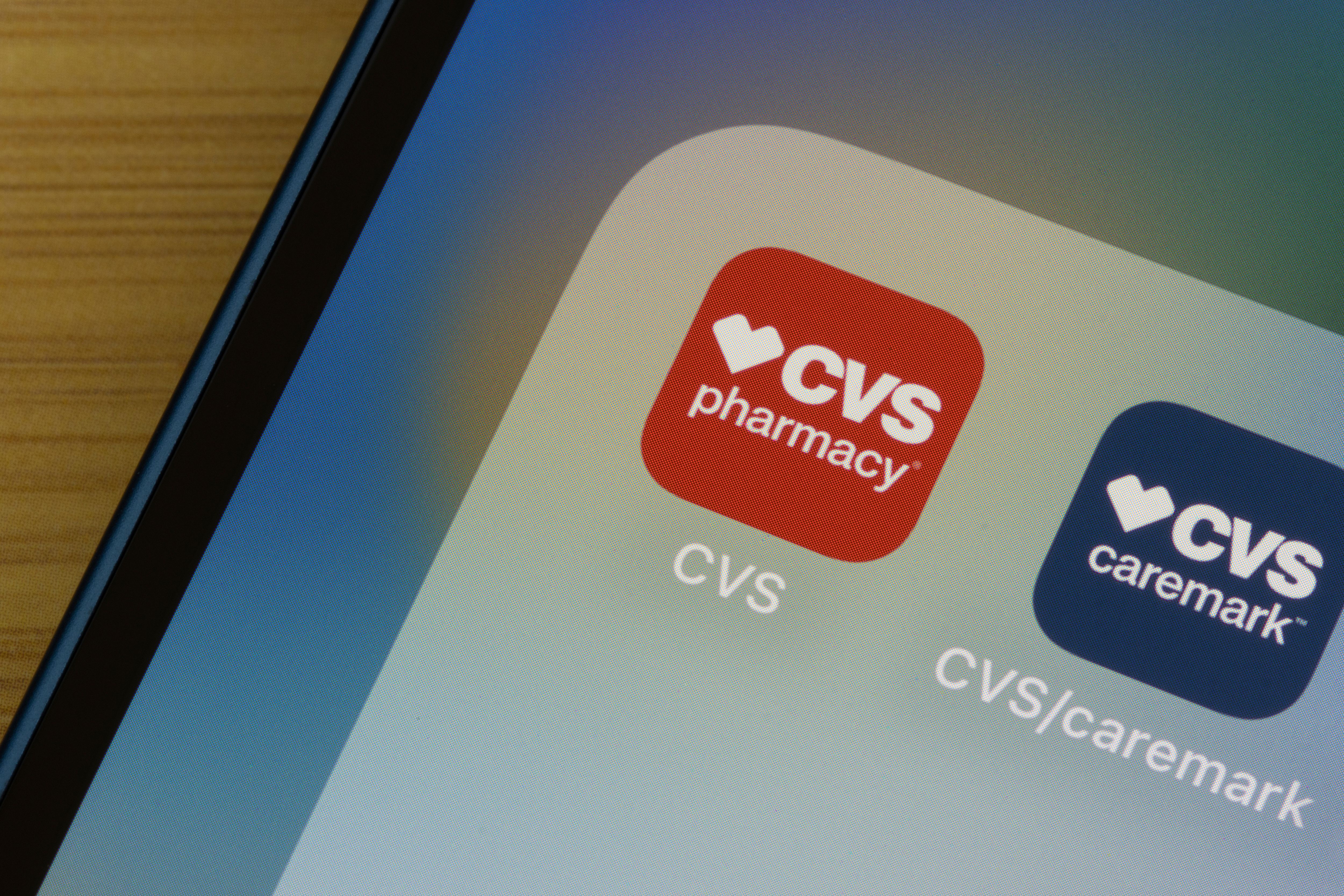 CVS Pharmacy, CVS Caremark applications on smartphone | Image Credit: © Tada Images - stock.adobe.com