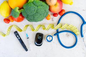raw vegetables with blood glucose meter, syringe, lancet and stethoscope on desk, diabetes healthy diet concept - Image credit: neirfy | stock.adobe.com
