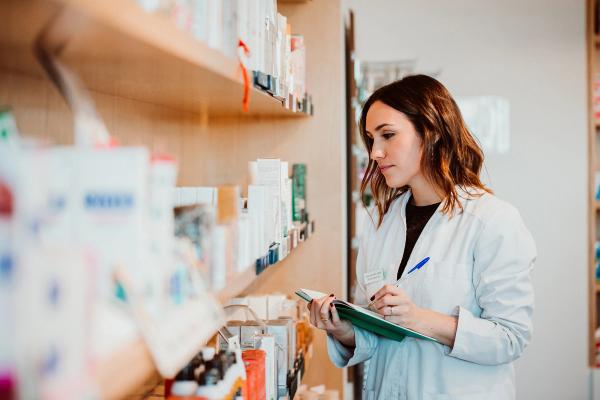 Pharmacist working in a pharmacy -- Image credit: lubero | stock.adobe.com