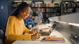 Student taking a written exam on a computer -- Image credit: Gorodenkoff | stock.adobe.com