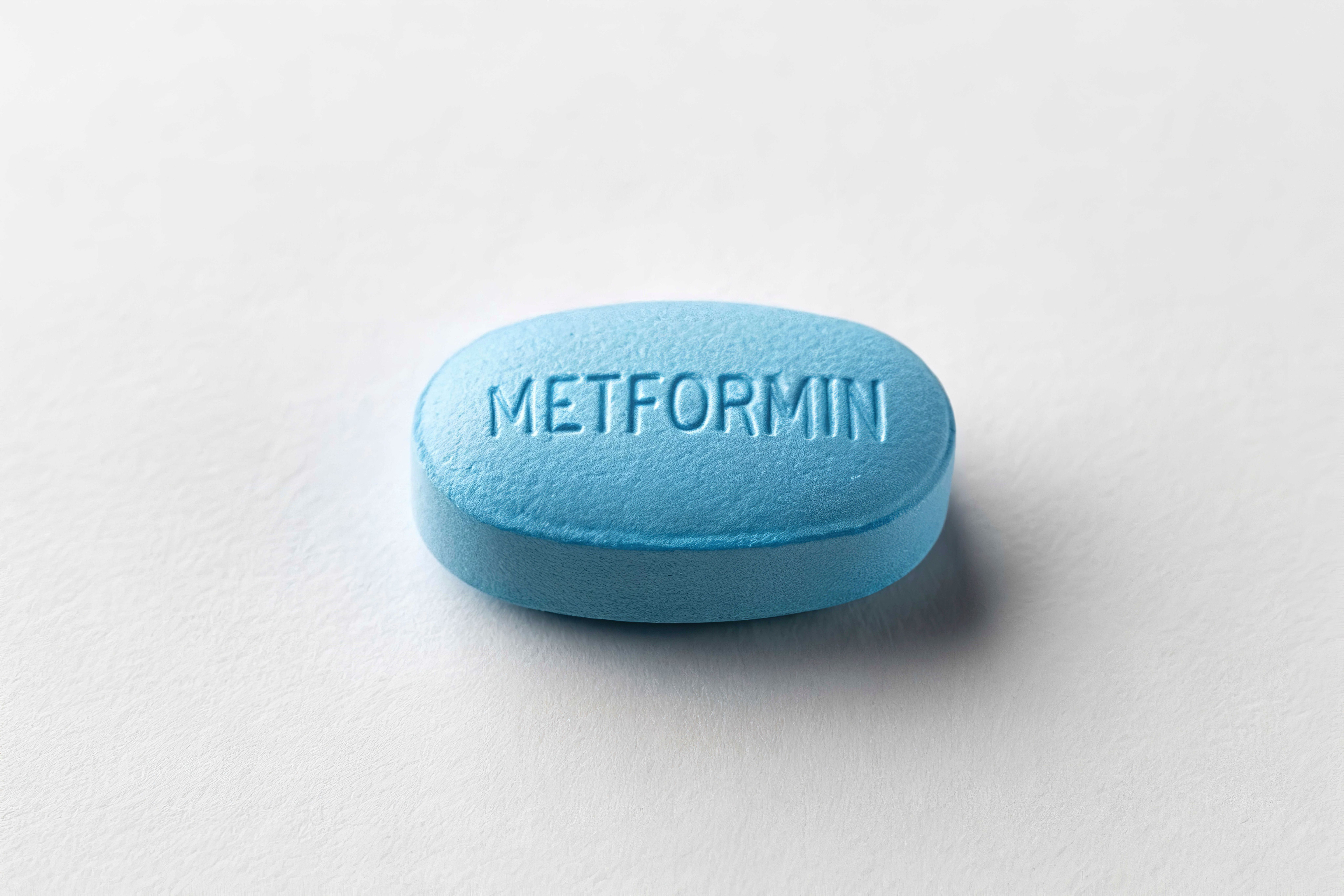 Metformin in a pill on a solid white background - Image credit: SMZahid | stock.adobe.com
