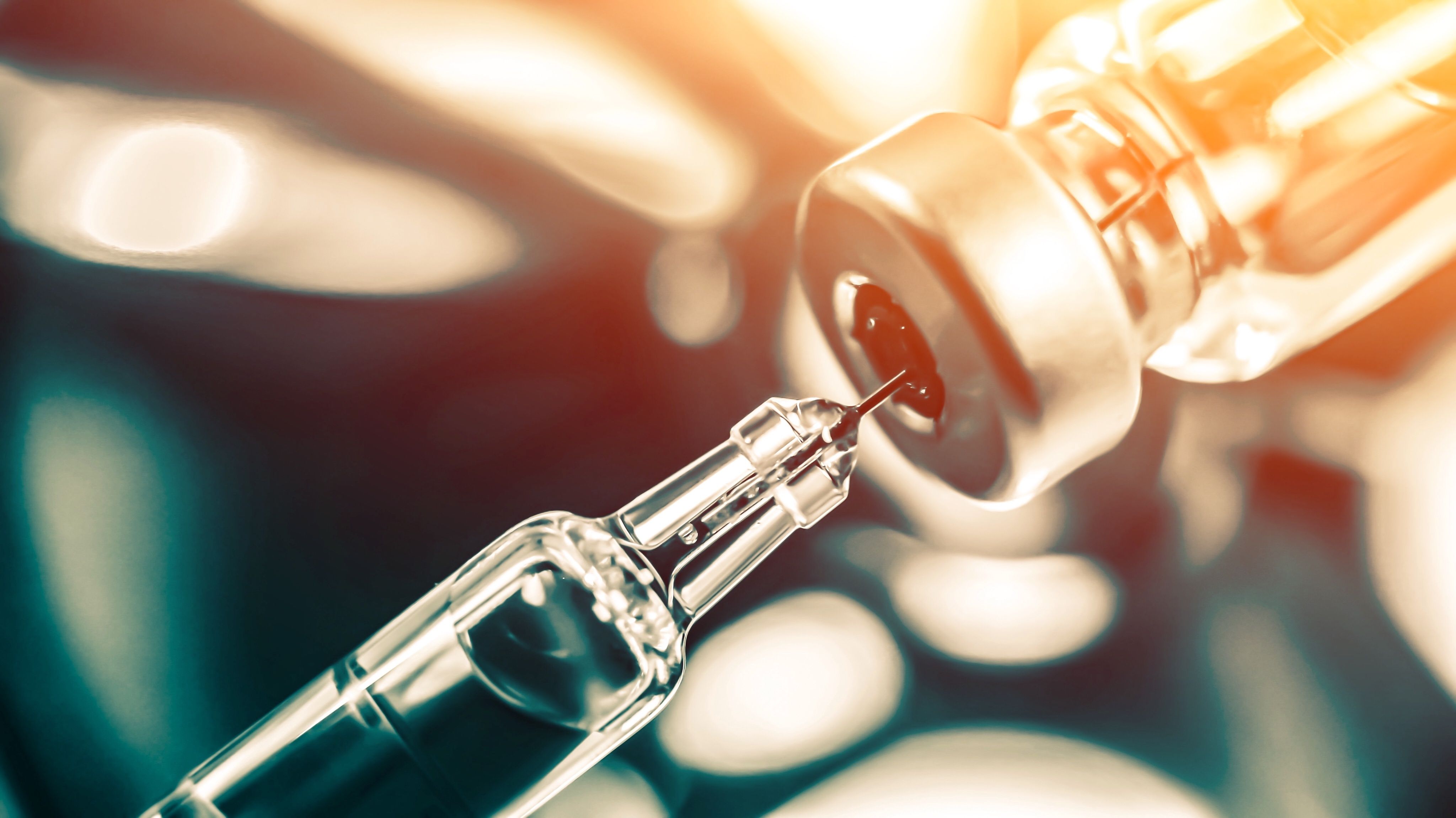 Vaccine vial dose flu shot drug needle syringe, medical concept | Image Credit: Trsakaoe - stock.adobe.com