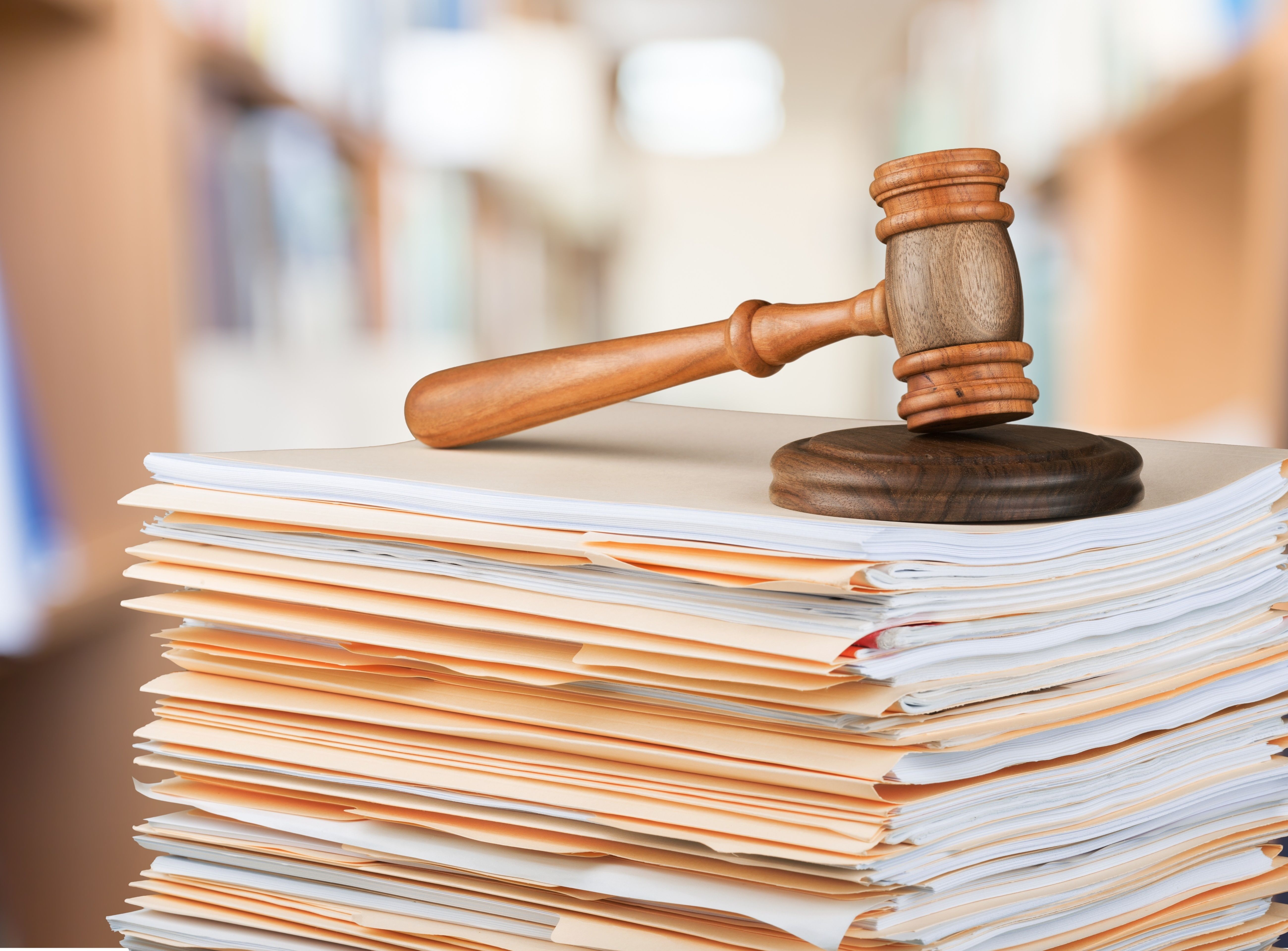Stack of files and gavel | Image credit: BillionPhotos.com - stock.adobe.com