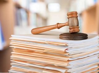 Stack of files and gavel | Image credit: BillionPhotos.com - stock.adobe.com