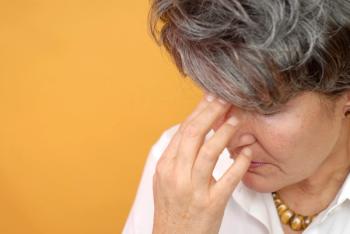 Woman with migraine
