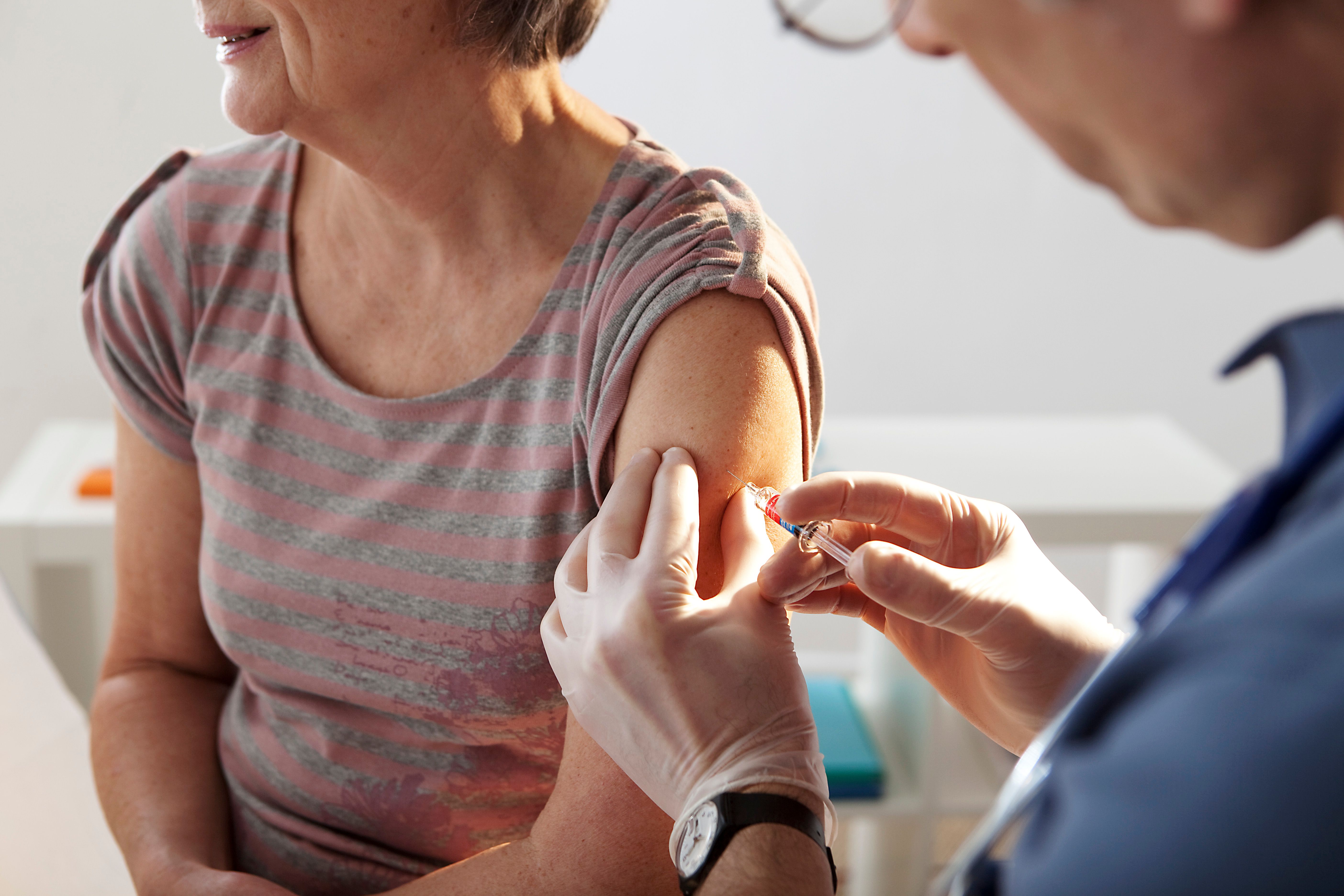Vaccinating an elderly person - Image credit: RFBSIP | stock.adobe.com