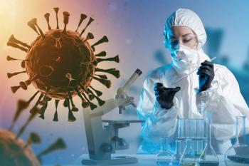 Doctor of Infectious Diseases. Scientist studies infection bacteria. Virus near doctor in chemical protection suit. Woman infectious disease specialist in respirator. Microscope and flasks on table | Image Credit: Grispb | stock.adobe.com