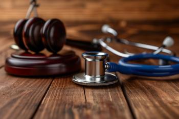 Stethoscope and gavel | Image Credit: © Joaquin Corbalan - stock.adobe.com