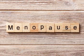 Wooden tiles spelling "menopause" -- Image credit: sosiukin | stock.adobe.com