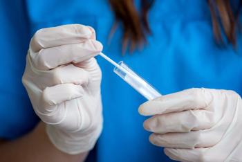 Health care worker testing a nasal swab