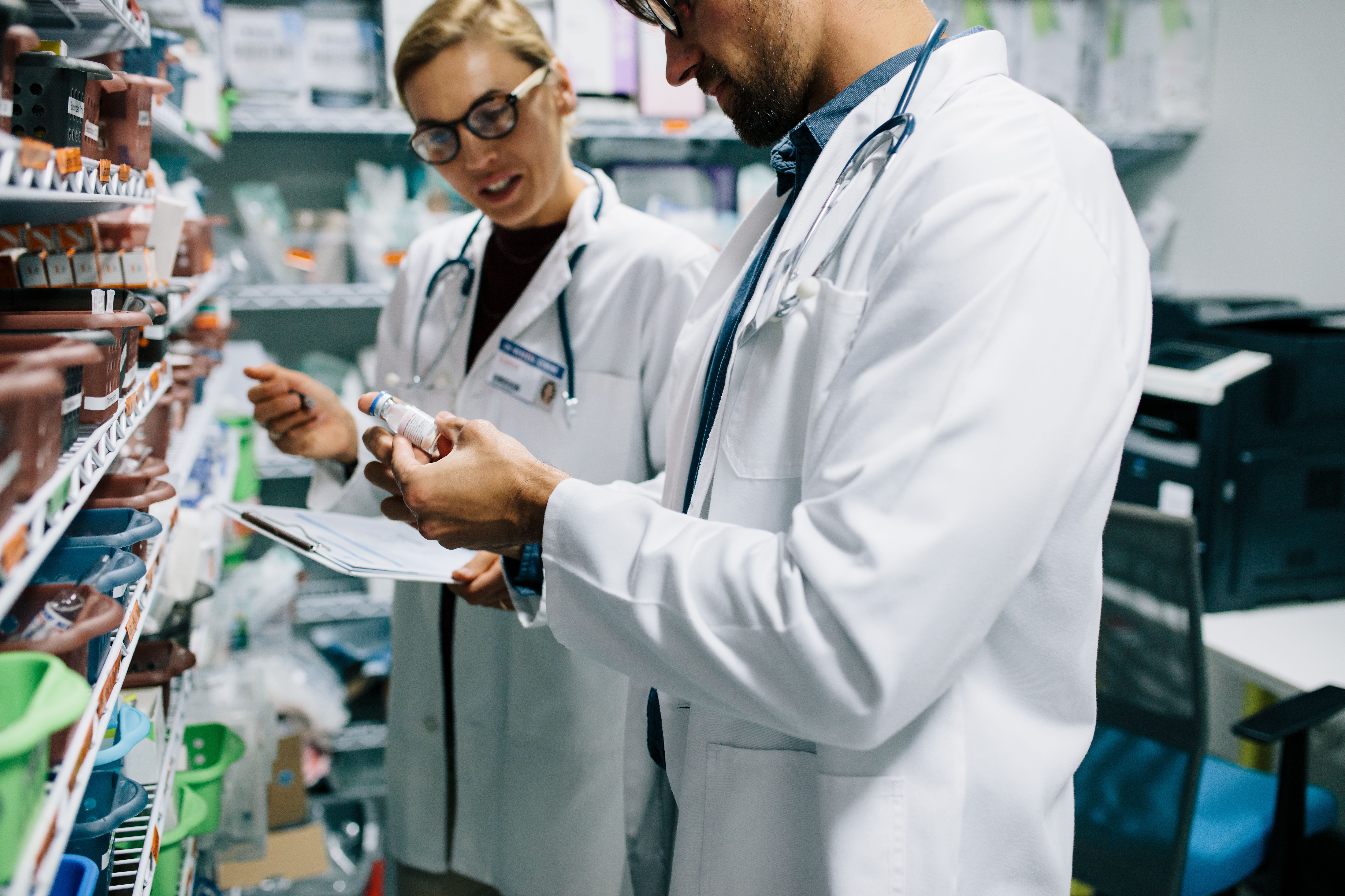Pharmacists checking inventory at pharmacy -- Image credit: Jacob Lund | stock.adobe.com