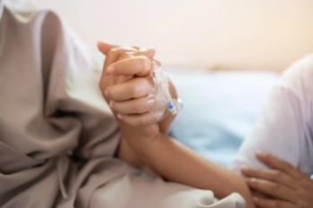Patient receiving comfort from a loved one
