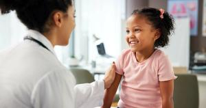 Pharmacist with a pediatric patient -- Image credit: Lawrenson25/peopleimages.com | stock.adobe.com