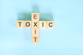 Resignation from toxic job, workplace or relationship concept. Exit and toxic wooden block crossword puzzle flat lay in blue background - Image credit: Sulit.photos | stock.adobe.com