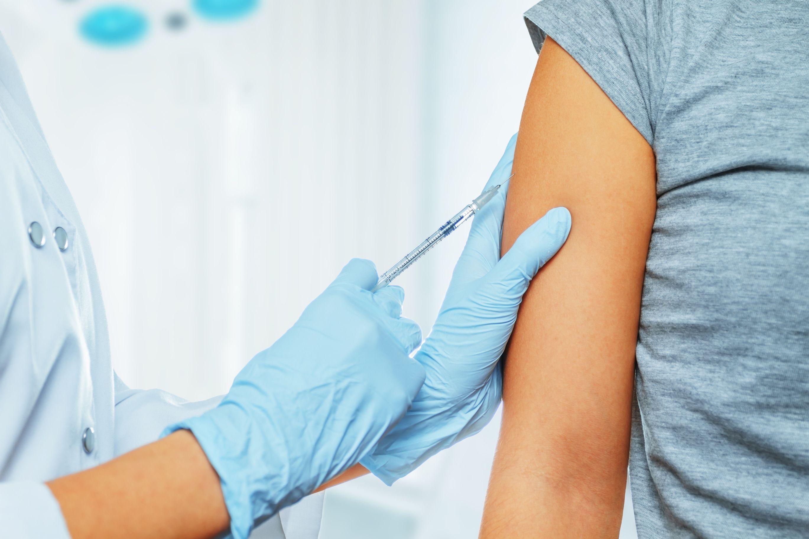 Vaccination in the shoulder - Image credit: Alex Photo | stock.adobe.com