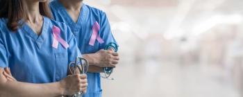 Breast cancer awareness pink ribbon raising awareness on woman health and female illness in October month with bow color on male and female surgical doctor gown in clinic or hospital | Image Credit: Chinnapong | stock.adobe.com