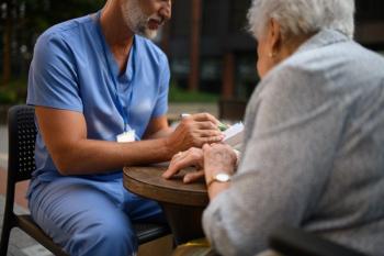 Pharmacist answering patient's health care questions -- Image credit: Halfpoint | stock.adobe.com