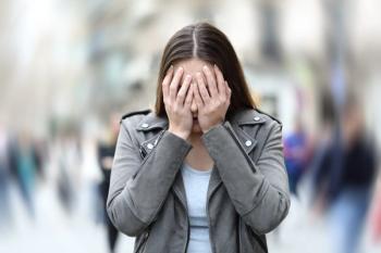 Woman experiencing a panic attack -- Image credit: Antonioguillem | stock.adobe.com