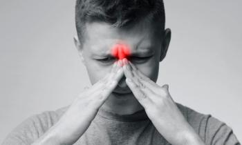 Patient with chronic rhinosinusitis -- Image credit: Prostock-studio | stock.adobe.com