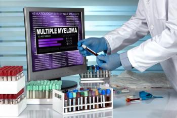 Lab technician testing blood samples for MM -- Image credit: angellodeco | stock.adobe.com