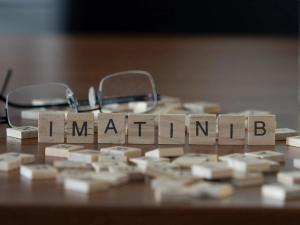 Imatinib spelled out with wooden blocks | Image Credit: © lexiconimages - stock.adobe.com