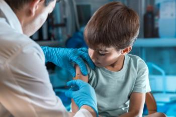 Child receiving injection -- Image credit: angellodeco | stock.adobe.com