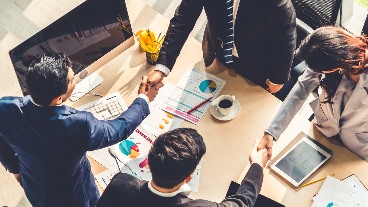 Business acquisition handshake