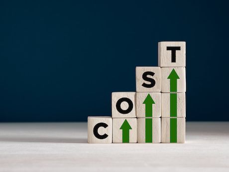 Cost increase and inflation concept. The word cost on wooden cubes with arrows going up | © Cagkan | Adobe Stock