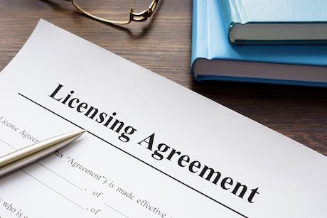 Empty licensing agreement application form and pen. | ©Vitalii Vodolazskyi | Adobe Stock