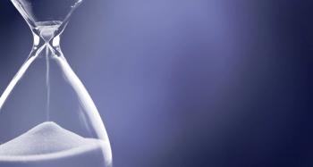 Sand running through the bulbs of an hourglass | Image Credit: © BillionPhotos.com - stock.adobe.com