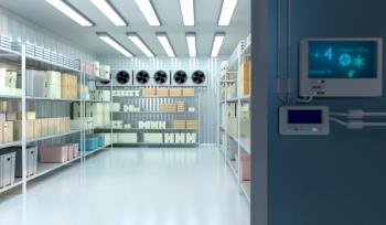 cold storage room with shelves stocked with boxes and containers. Cooling fans and a digital temperature control panel ensure precise climate conditions. refrigeration - storage shelves | Image Credit: © Grispb - stock.adobe.com