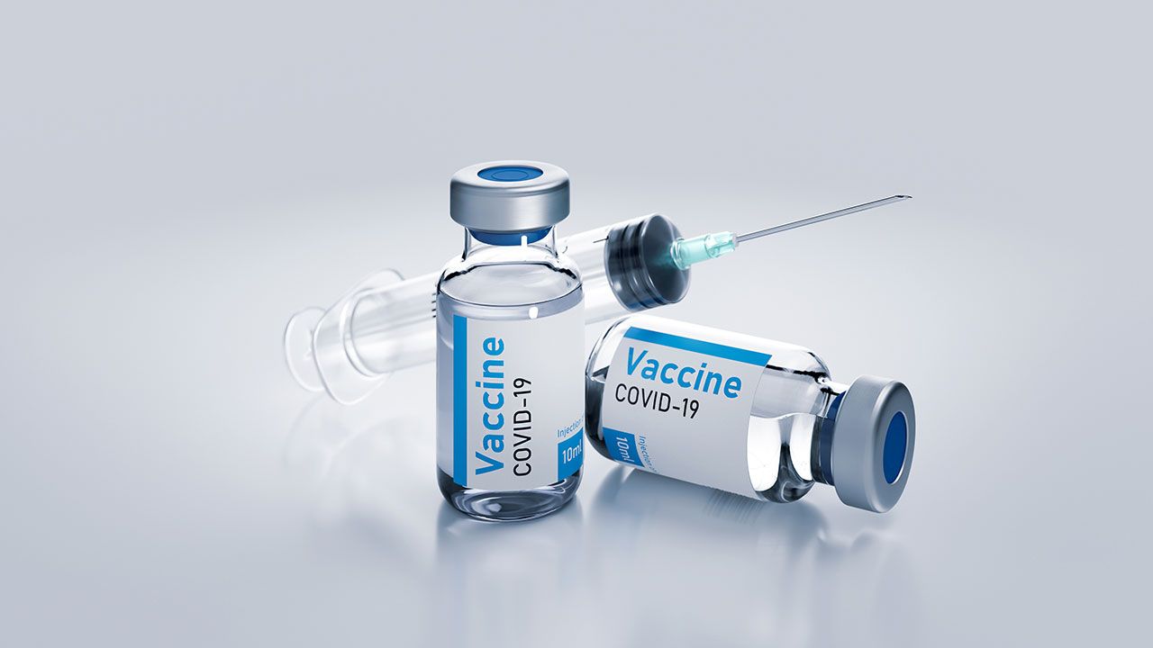 Ampoules vaccine from coronavirus with syringe 3d render illustration on white. | Image Credit: © mylisa - mylisa - Stock.adobe.com