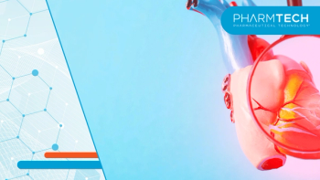 Medical mock-up of a heart under a magnifying glass on a blue background. Heart disease concept, inflammation of the heart muscle, myocardial infarction, coronary heart disease.| Image Source: ©HENADZY -stock.adobe.com